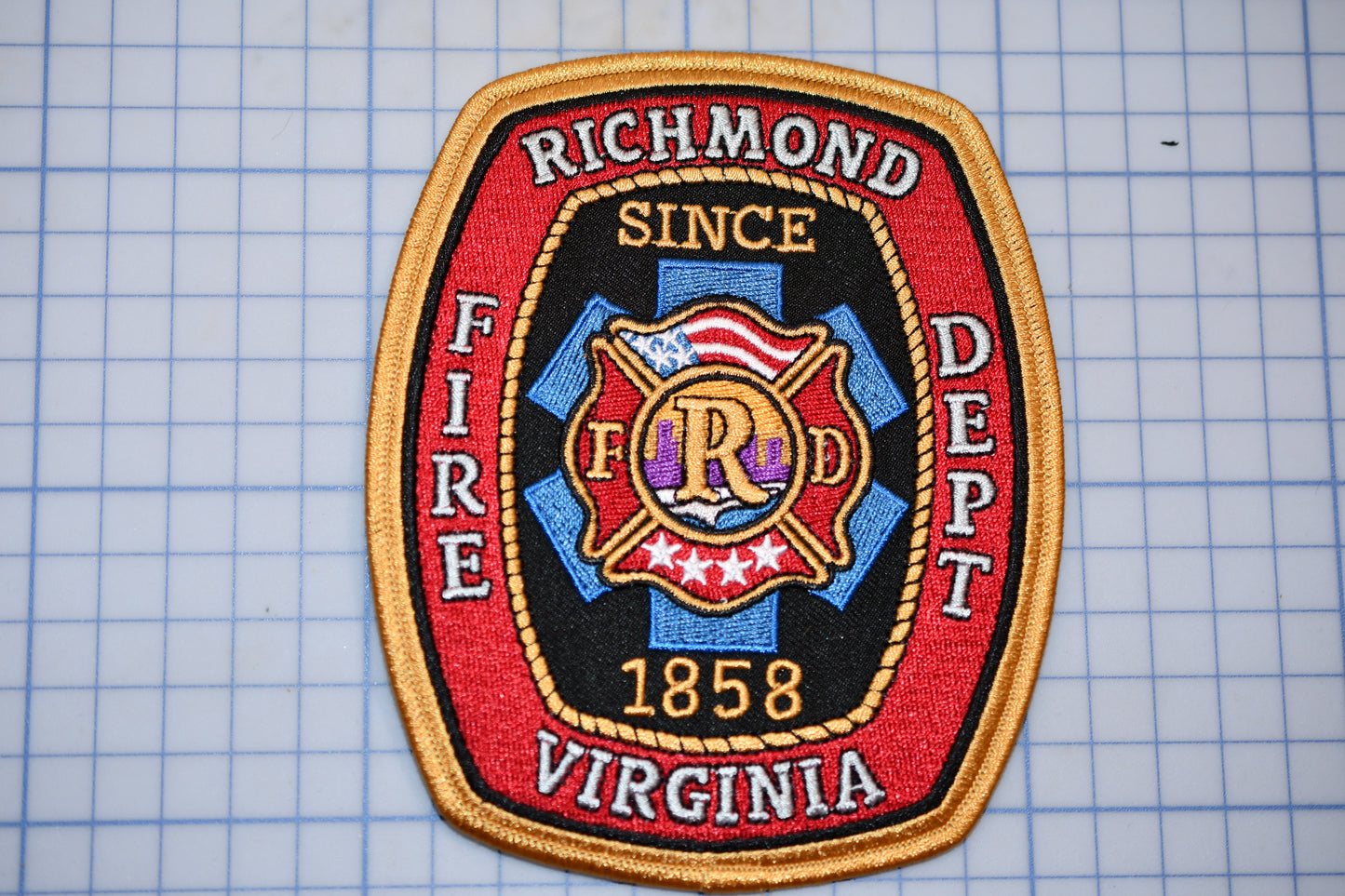 a patch with a fire department badge on it