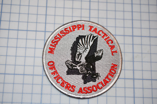 a patch with a picture of an eagle on it