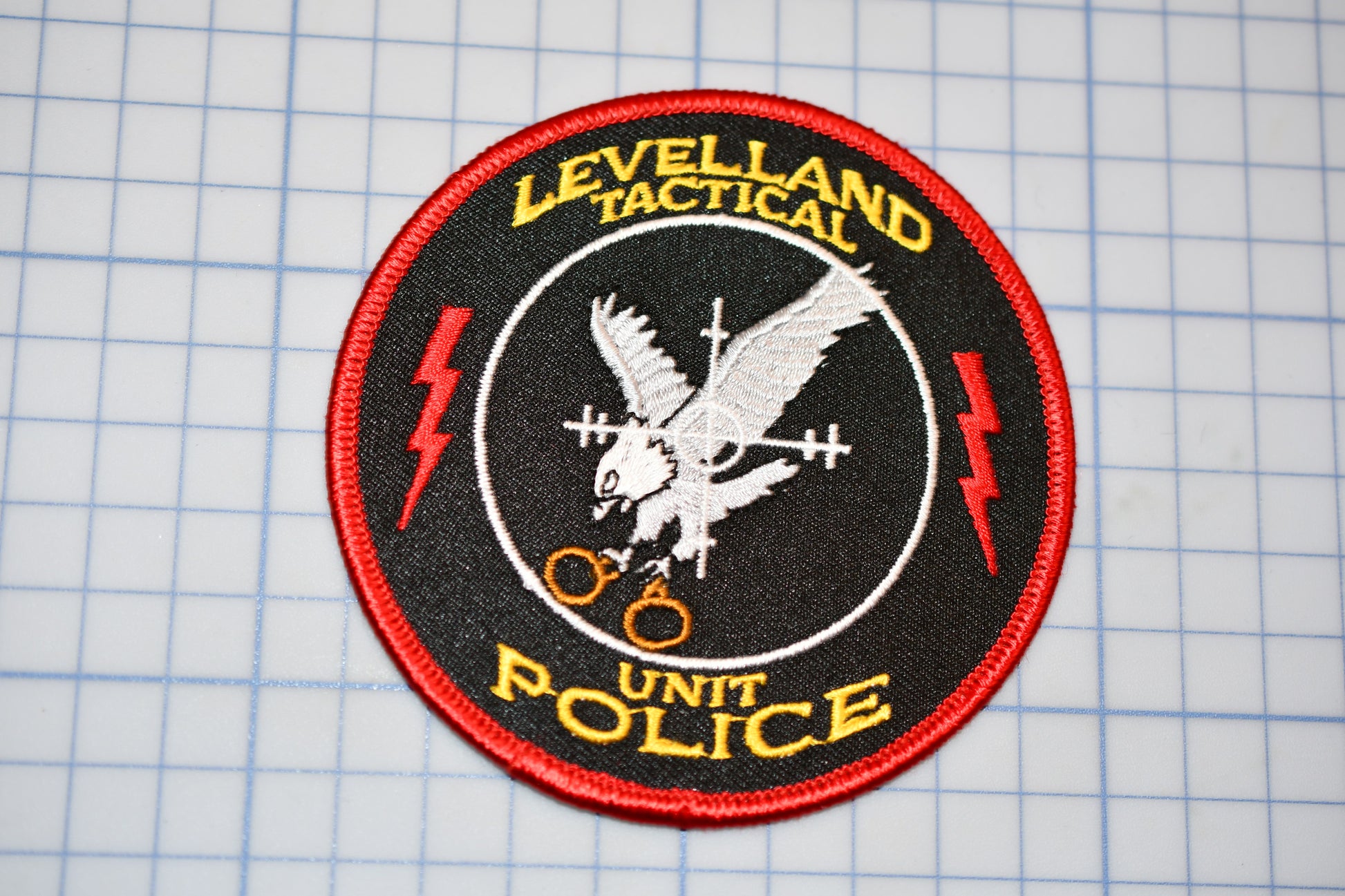 a patch that says levelland practical unit police