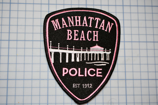 a patch with the words manhattan beach police on it