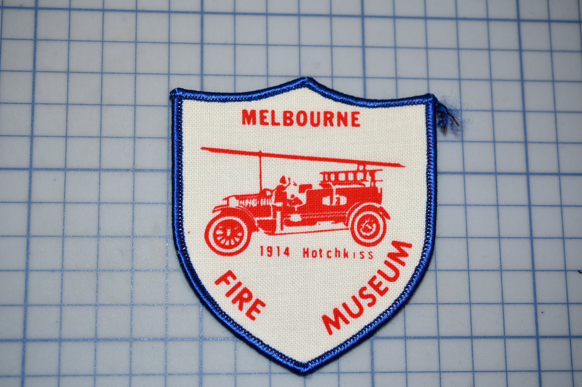 a patch with a picture of a fire truck on it