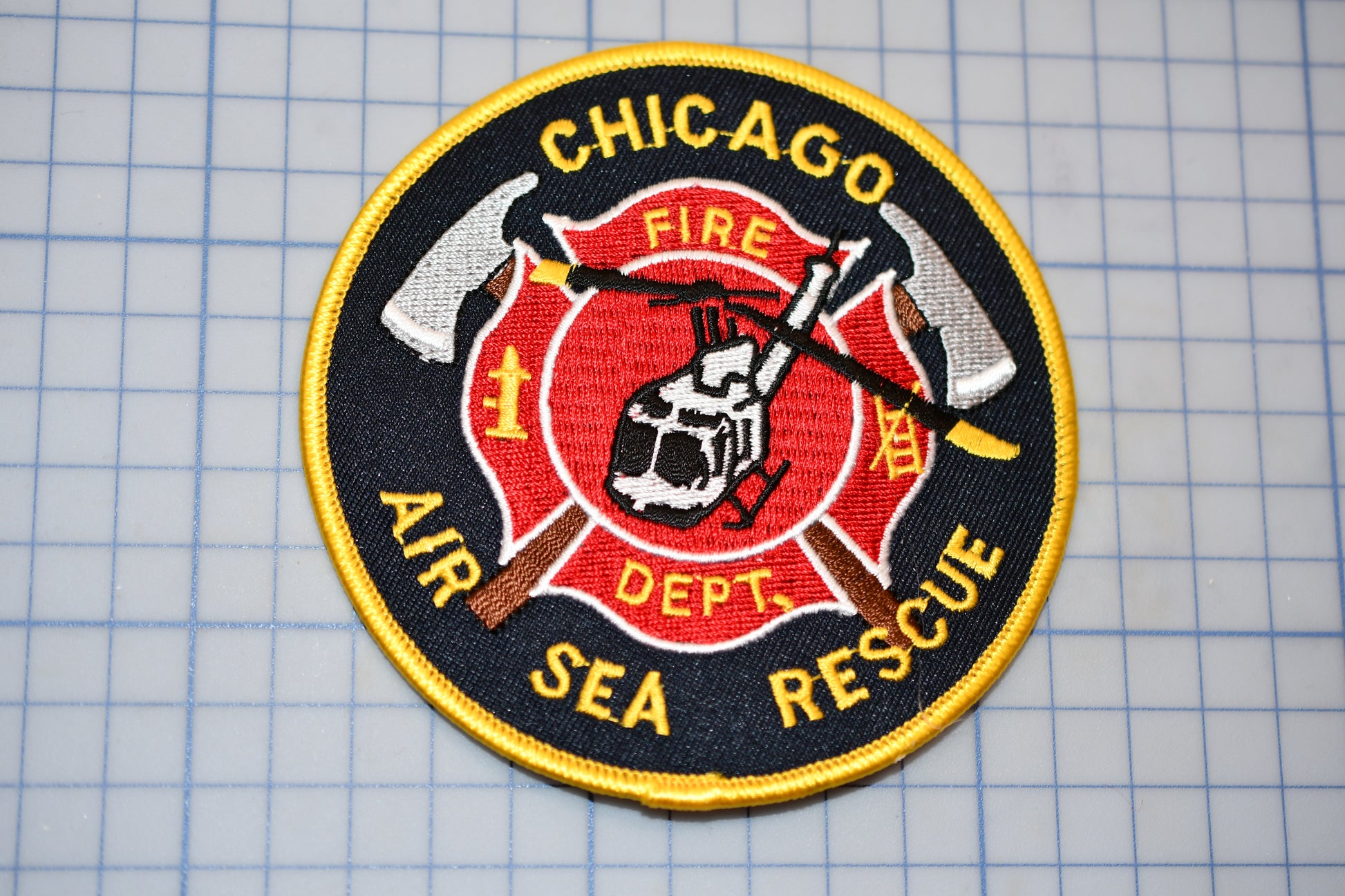 a chicago fire department patch on a cutting board