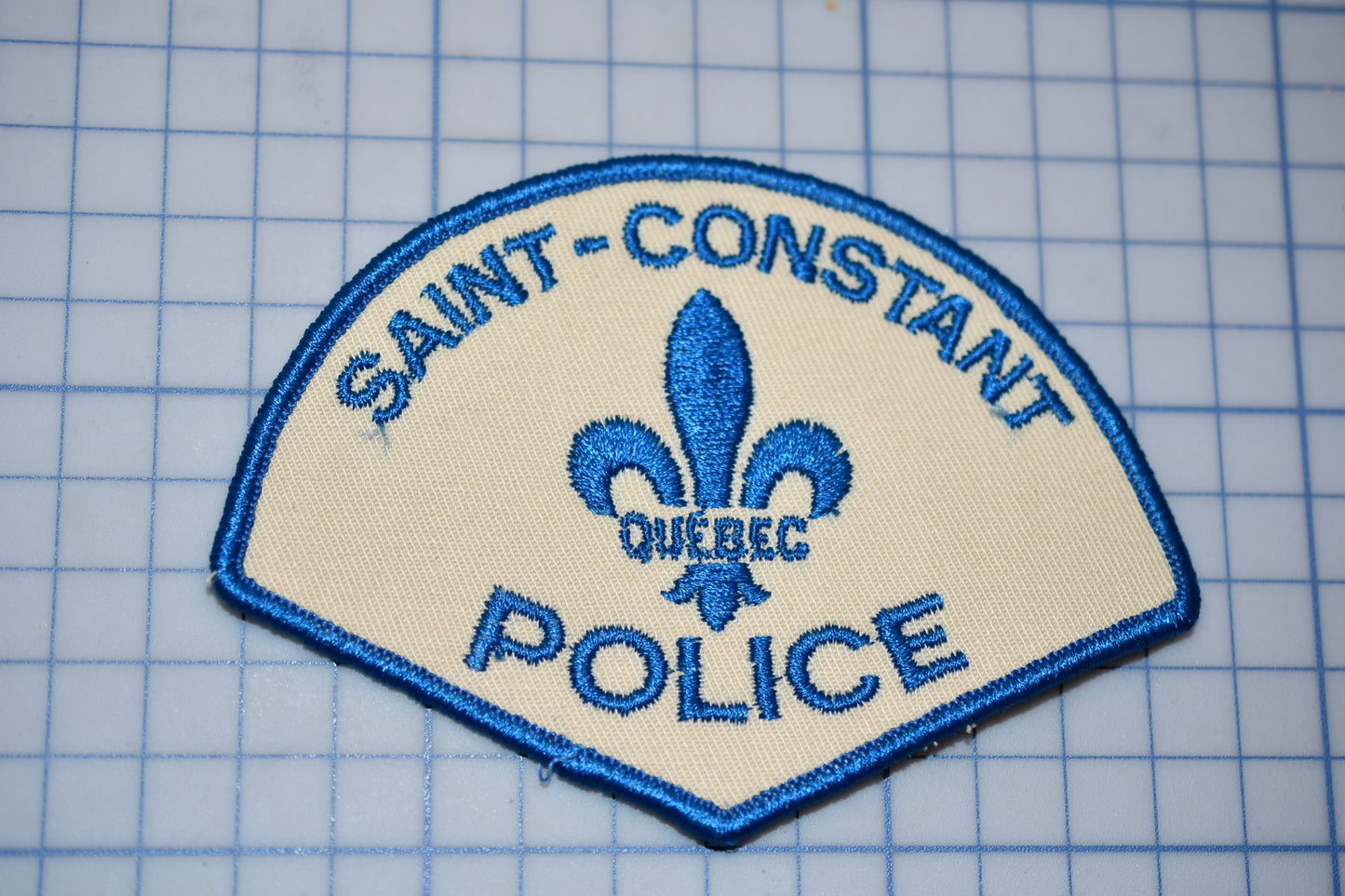 a patch that says saint - constant police on it