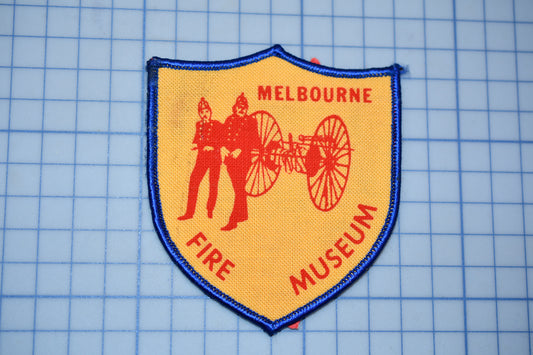 a patch with a picture of a fireman on it