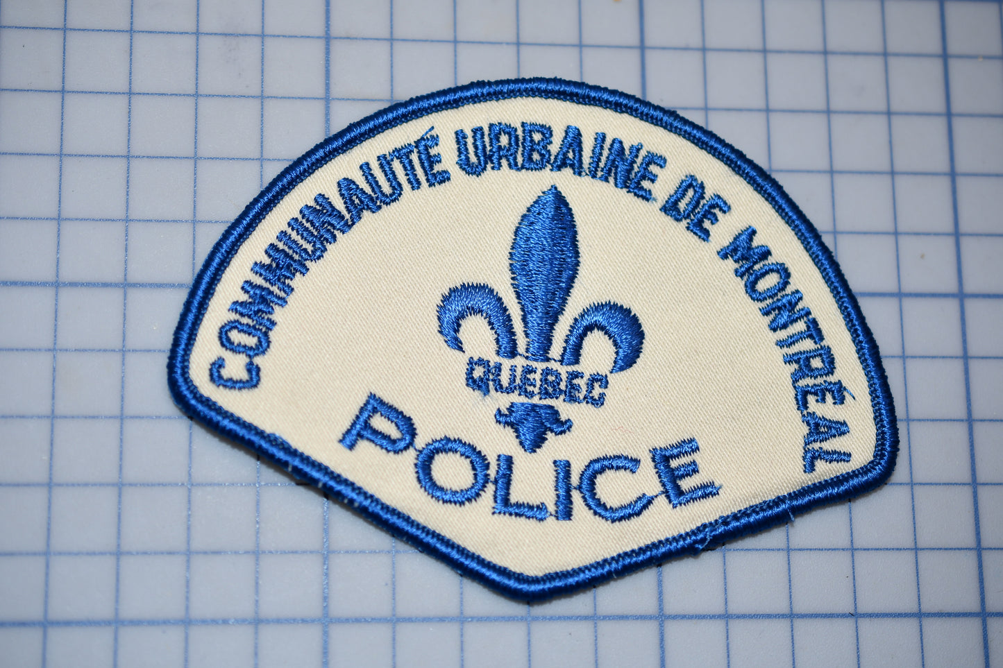 a police patch on a cutting board