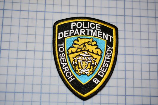 a police department patch on a piece of paper