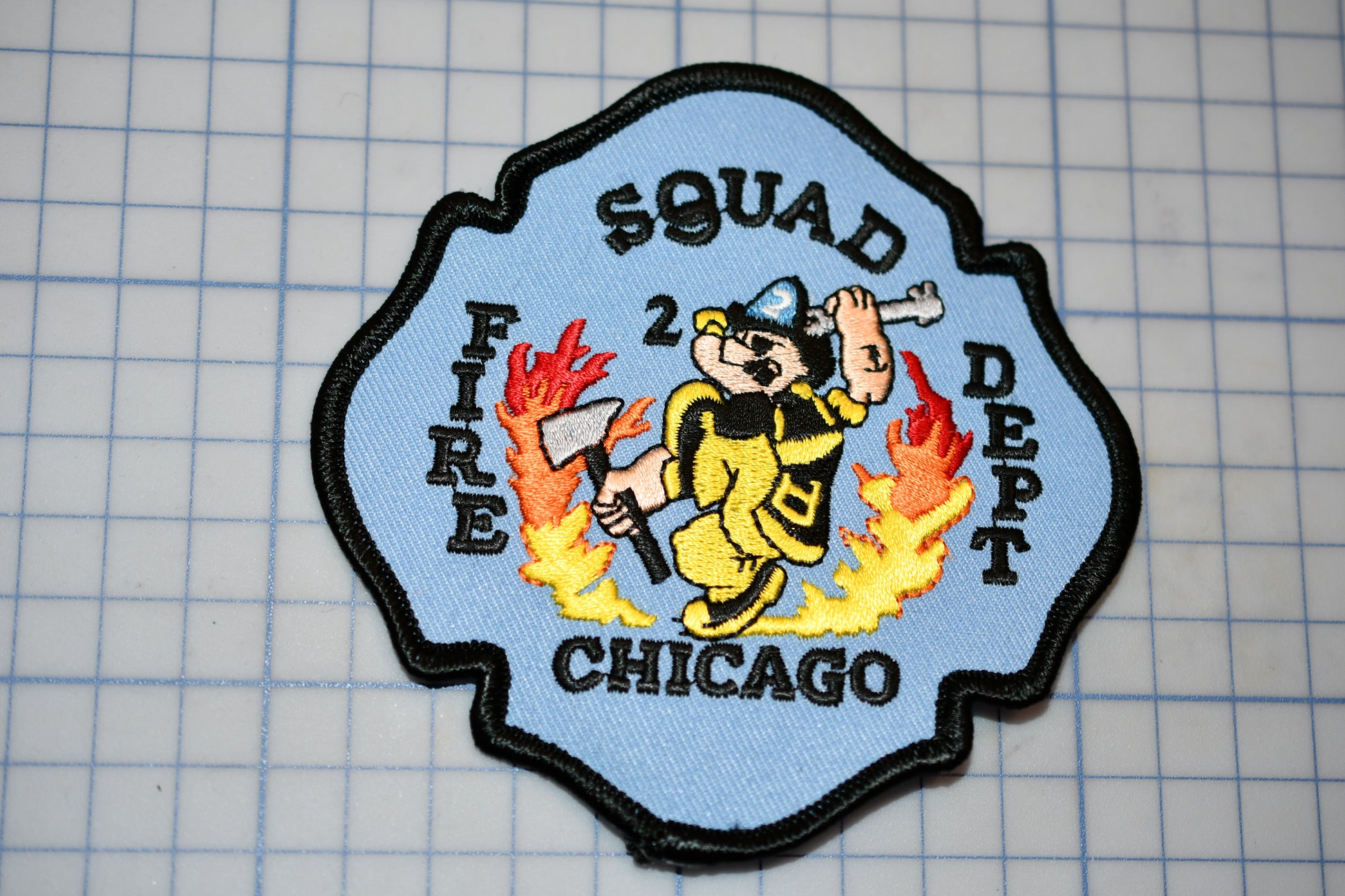 a patch with a firefighter on it