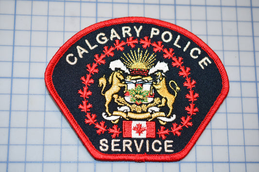 a patch with the words calgary police service on it