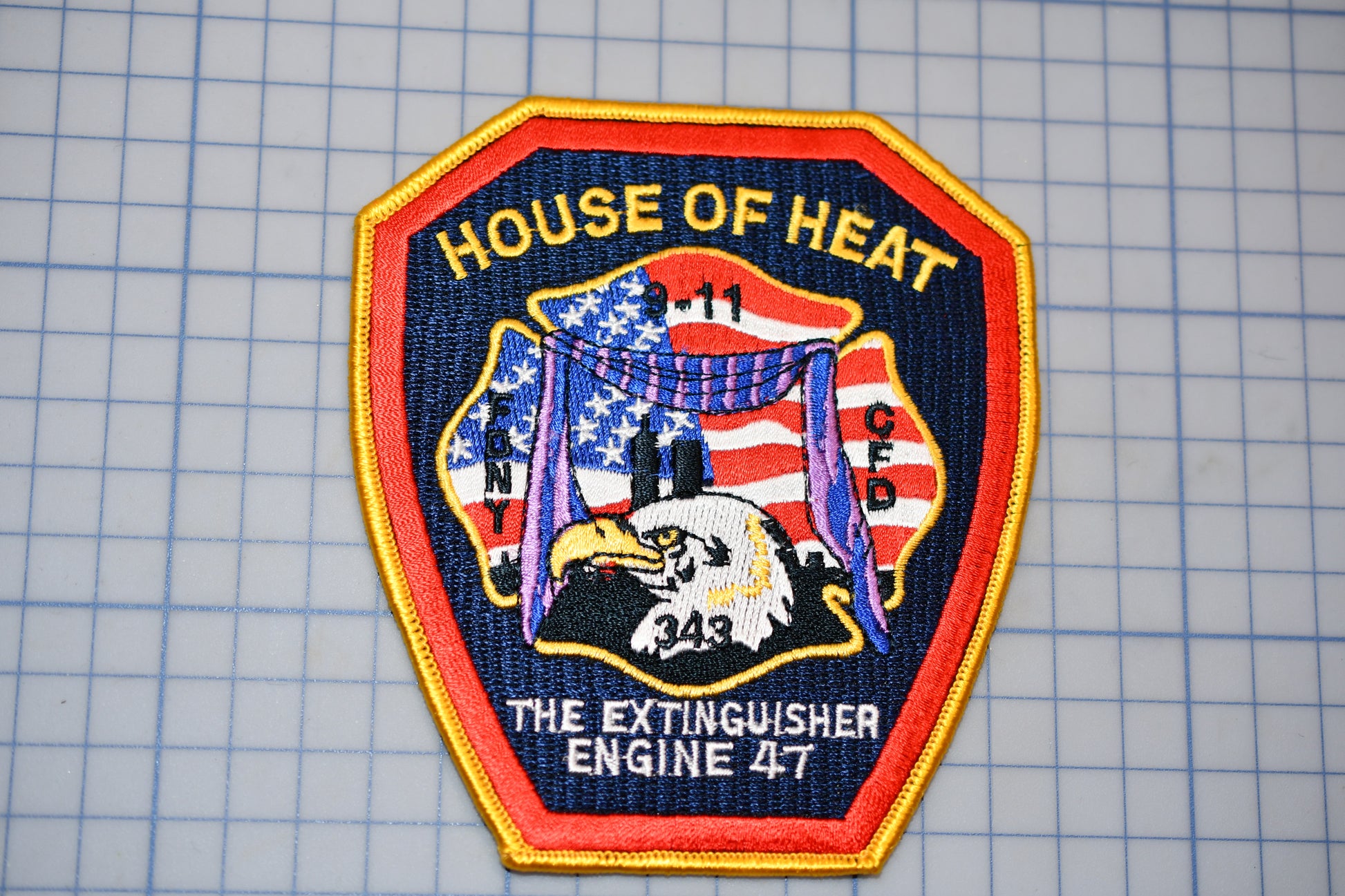 a patch with the words house of heat on it