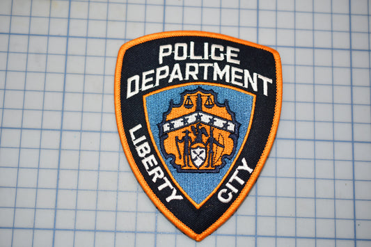 a police department patch on a piece of paper