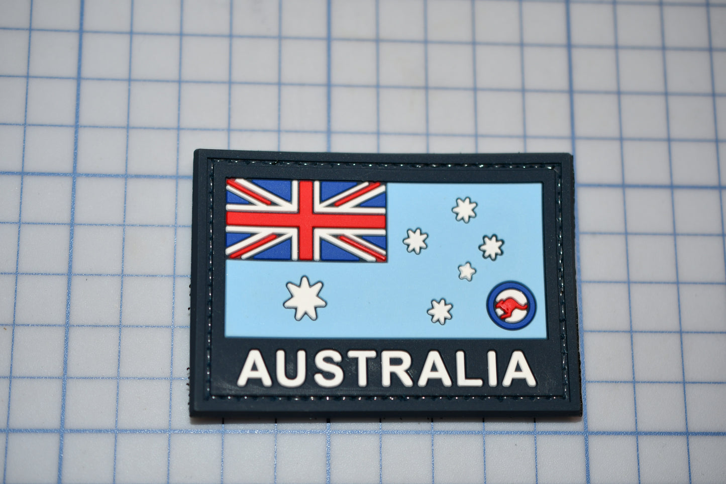 a patch with a picture of the flag of australia