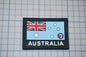 a patch with a picture of the flag of australia