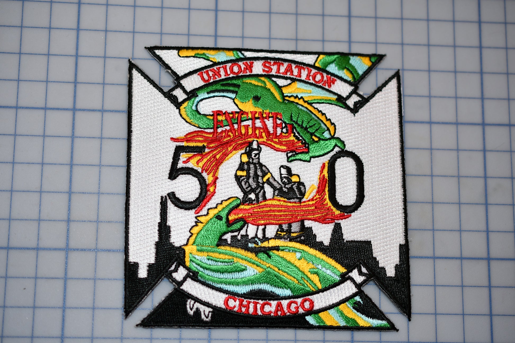 a patch with a picture of a fireman on it