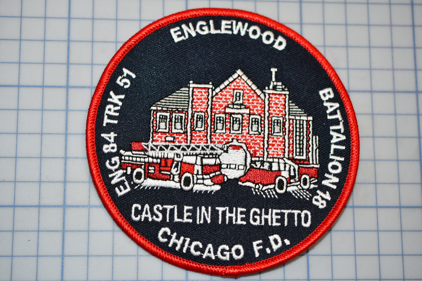 a patch with a picture of a castle in the ghetto