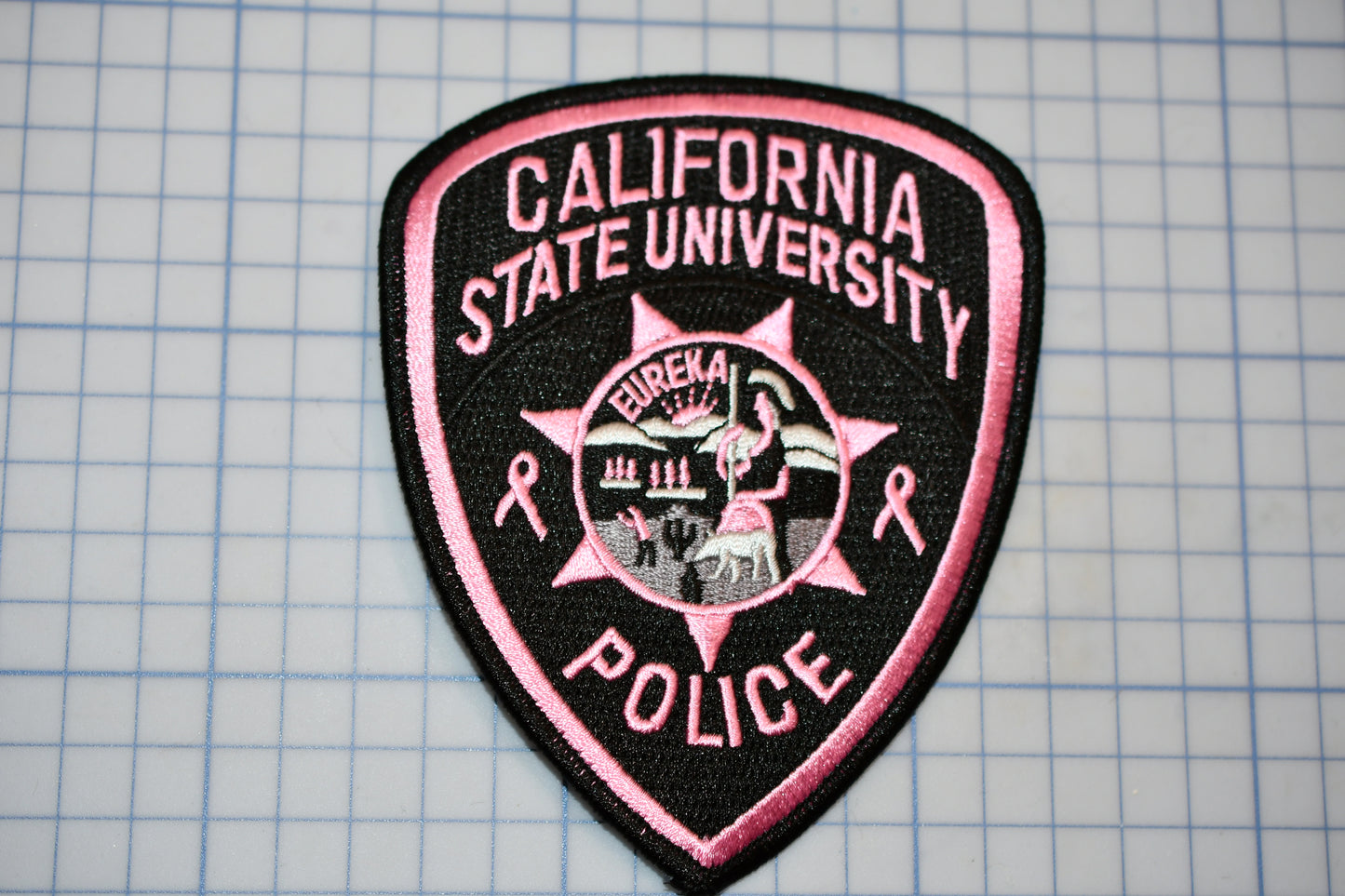 a police badge on a piece of paper