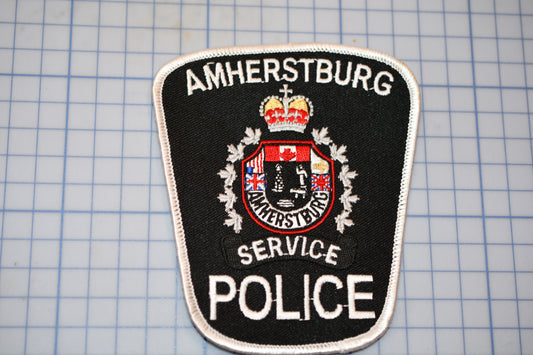 a police badge is shown on a cutting board