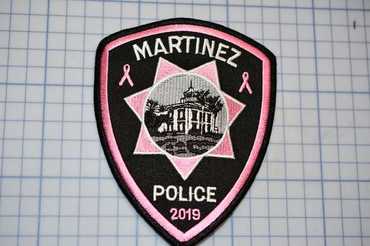 a police badge is shown on a piece of paper