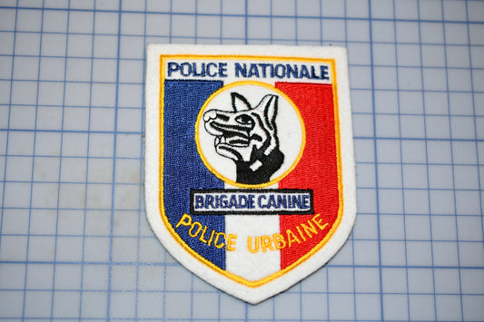 a police badge on a piece of paper