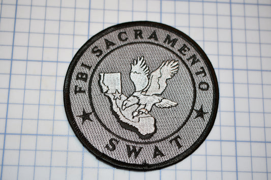 a patch with a picture of an eagle on it