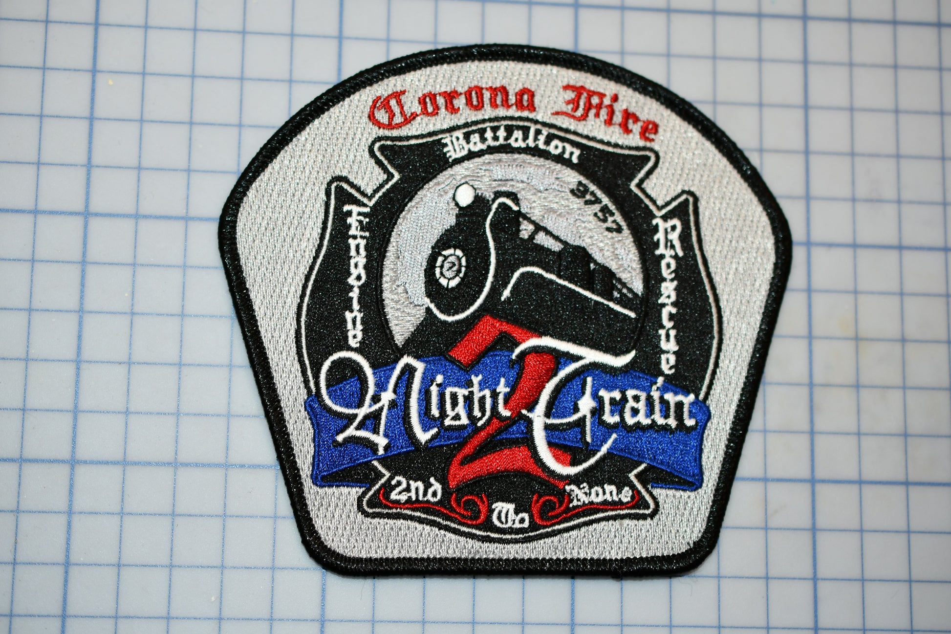 a patch with a horse on it sitting on a piece of paper