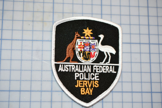 a patch with a picture of a kangaroo and a kangaroo on it