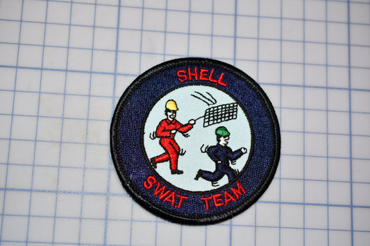 a patch with a picture of two people playing tennis