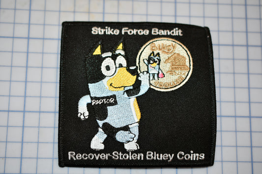 a patch with a picture of a cartoon character holding a coin