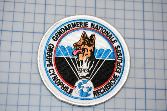 a patch with a german shepard on it