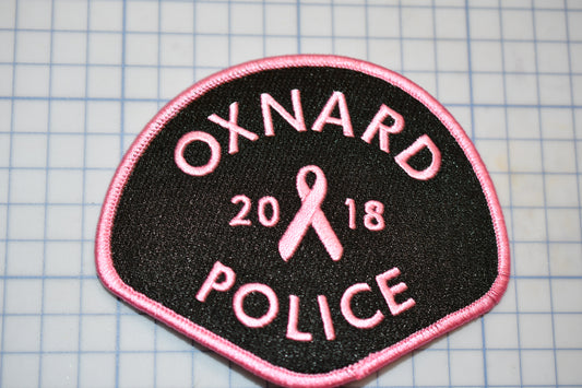 a patch with the words oxford police on it