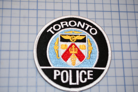 a patch with the word toronto police on it