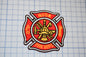 a patch with a fire department emblem on it