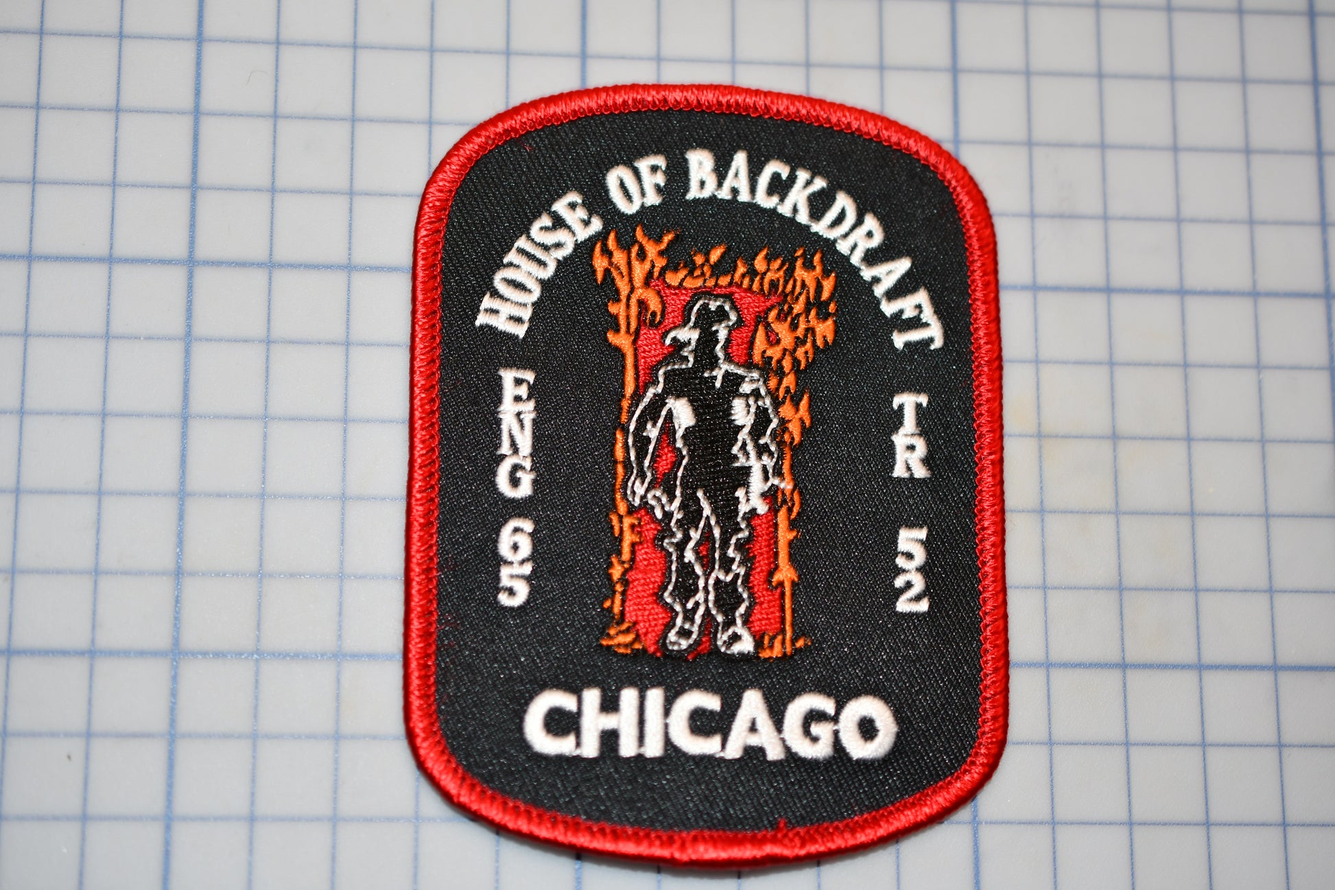 a chicago fire department patch on a piece of paper