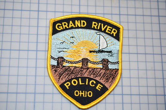 a police badge is shown on a piece of paper