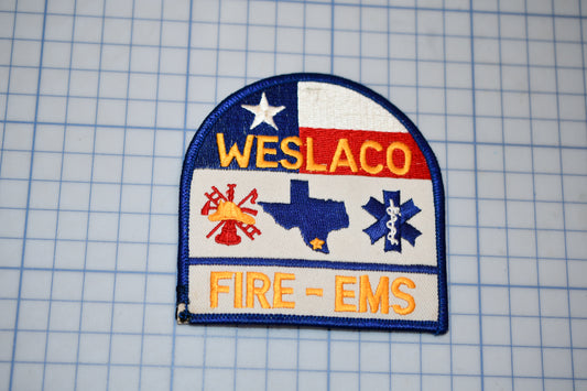 a patch with the words welslaco on it