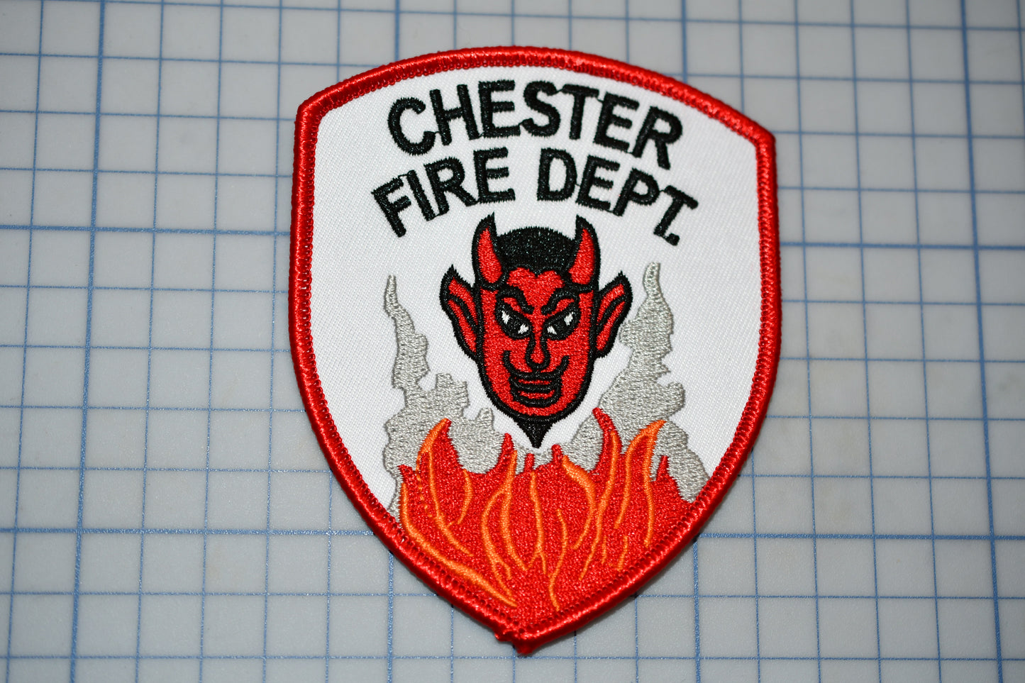 a patch that says chester fire dept on it