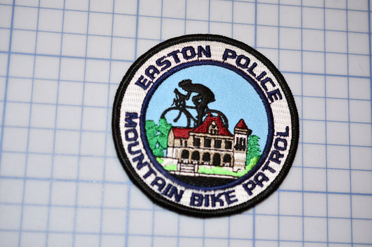 a patch with a picture of a bike rider on it