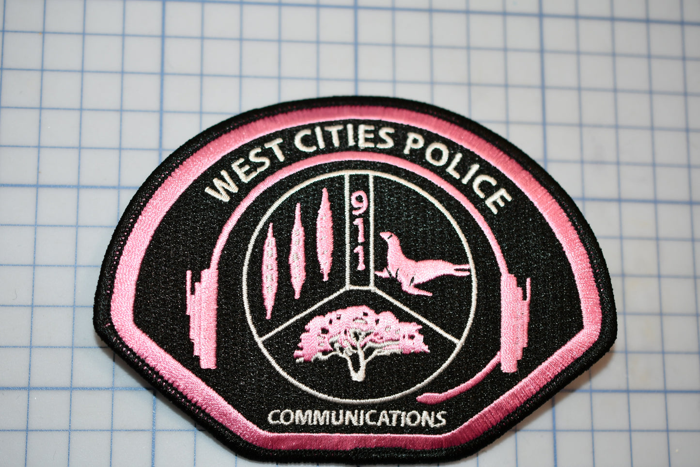 a patch with the words west cities police on it