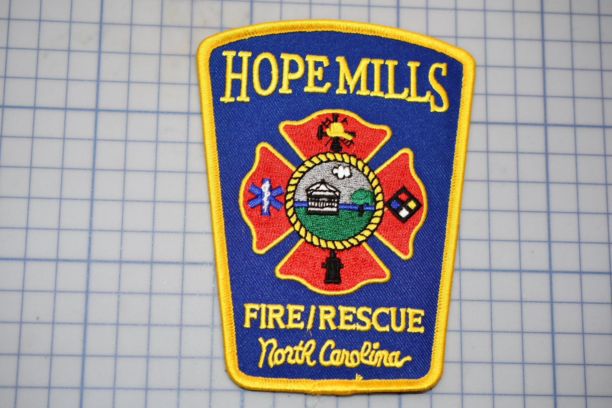 a patch with a fire rescue logo on it