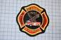 a patch with a fire department logo on it