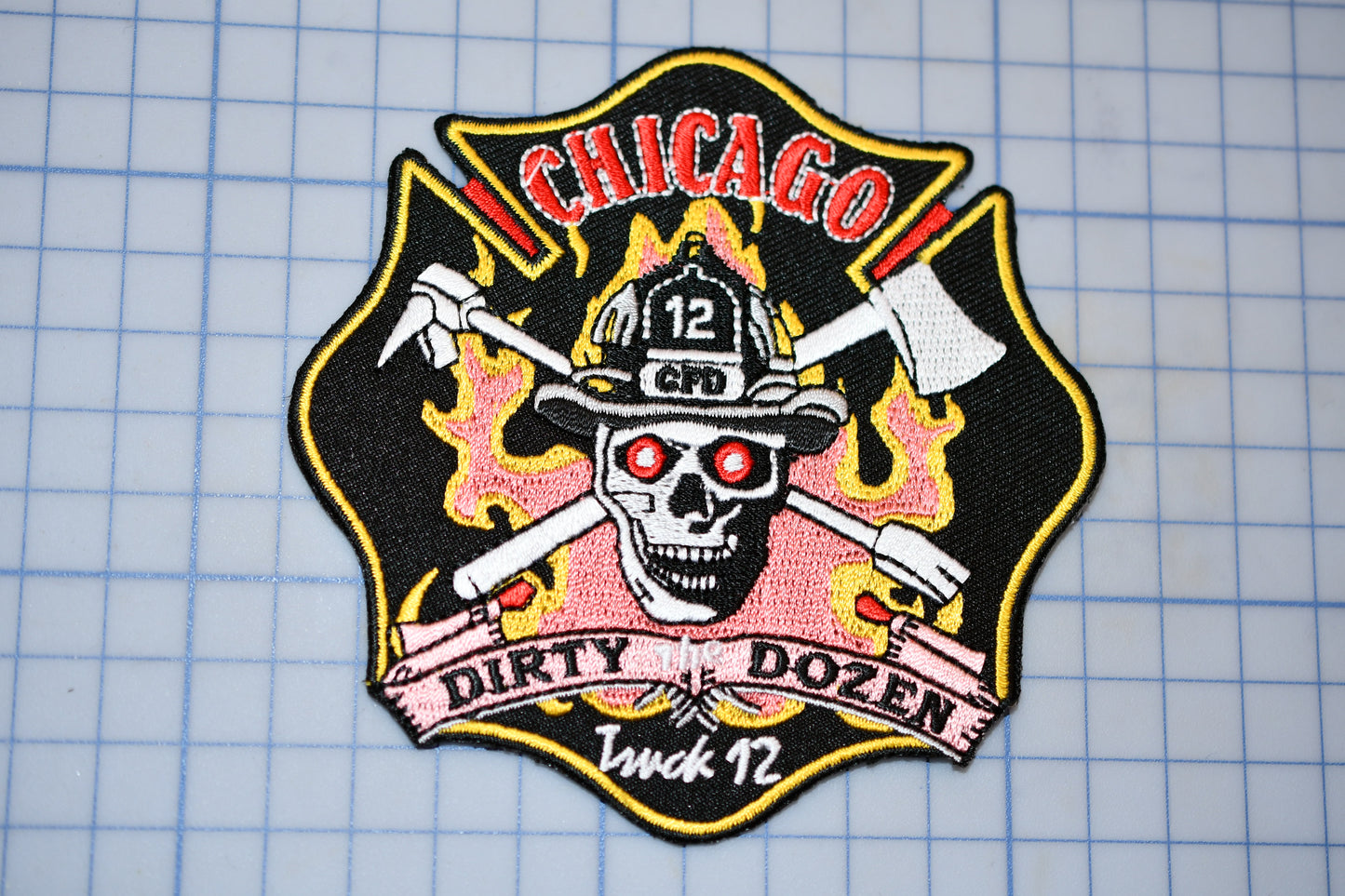 a chicago fire department patch on a cutting board