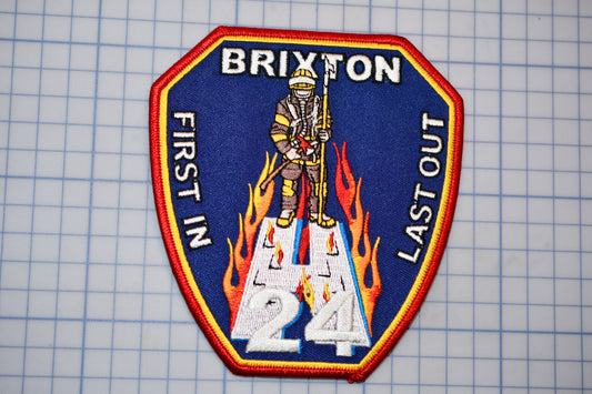 a patch with a picture of a firefighter on it