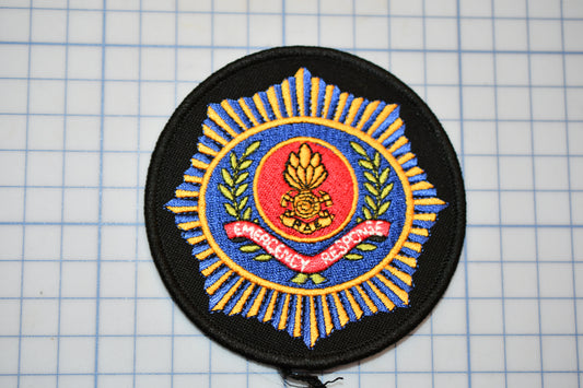 a picture of a badge on a piece of paper