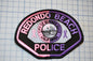 a patch that says redond beach police