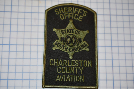 a badge that says sheriff's office charlotte county aviation