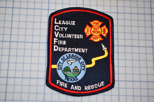 a fire and rescue patch on a cutting board