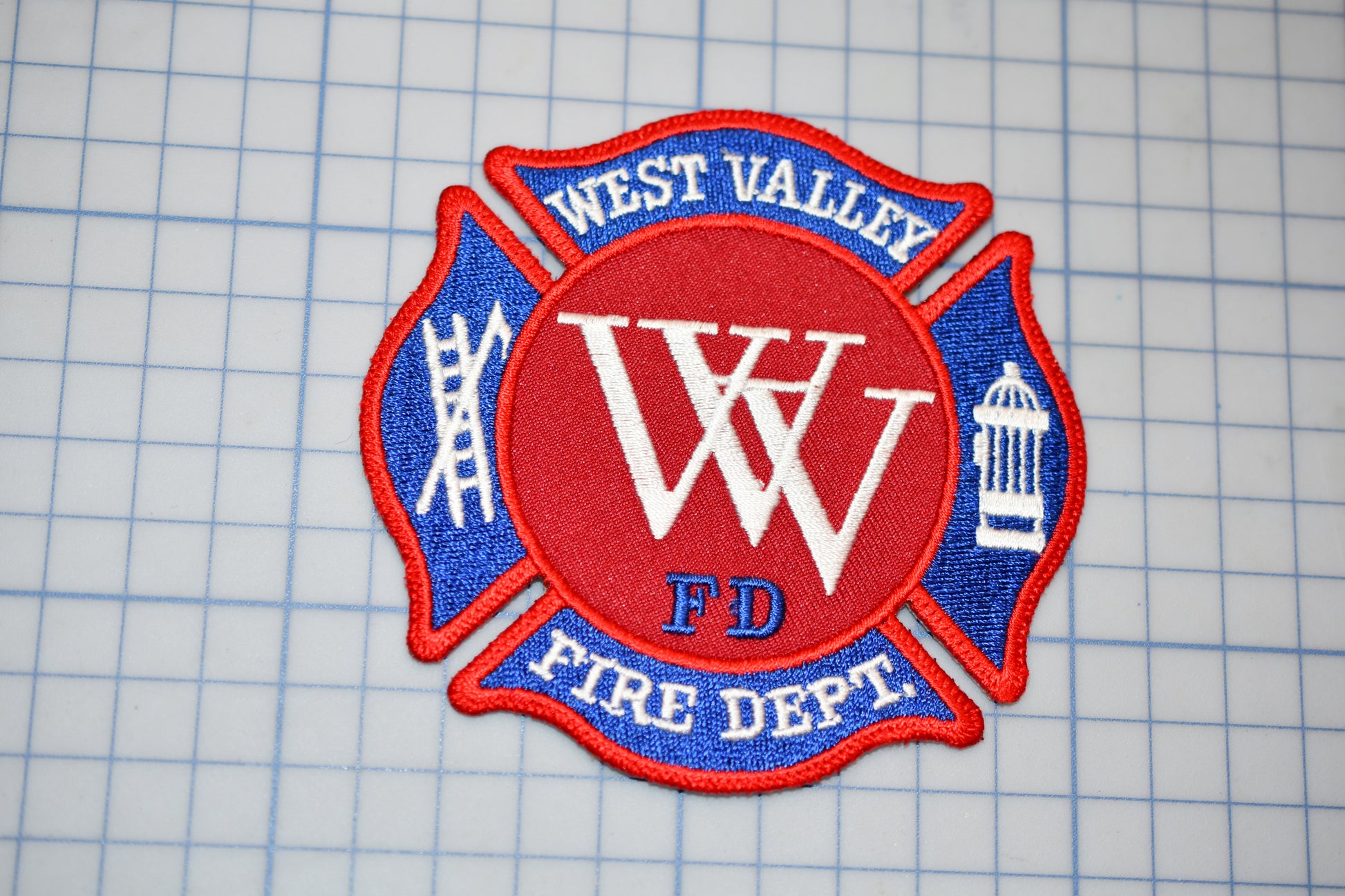 a patch with the words west valley fire department on it