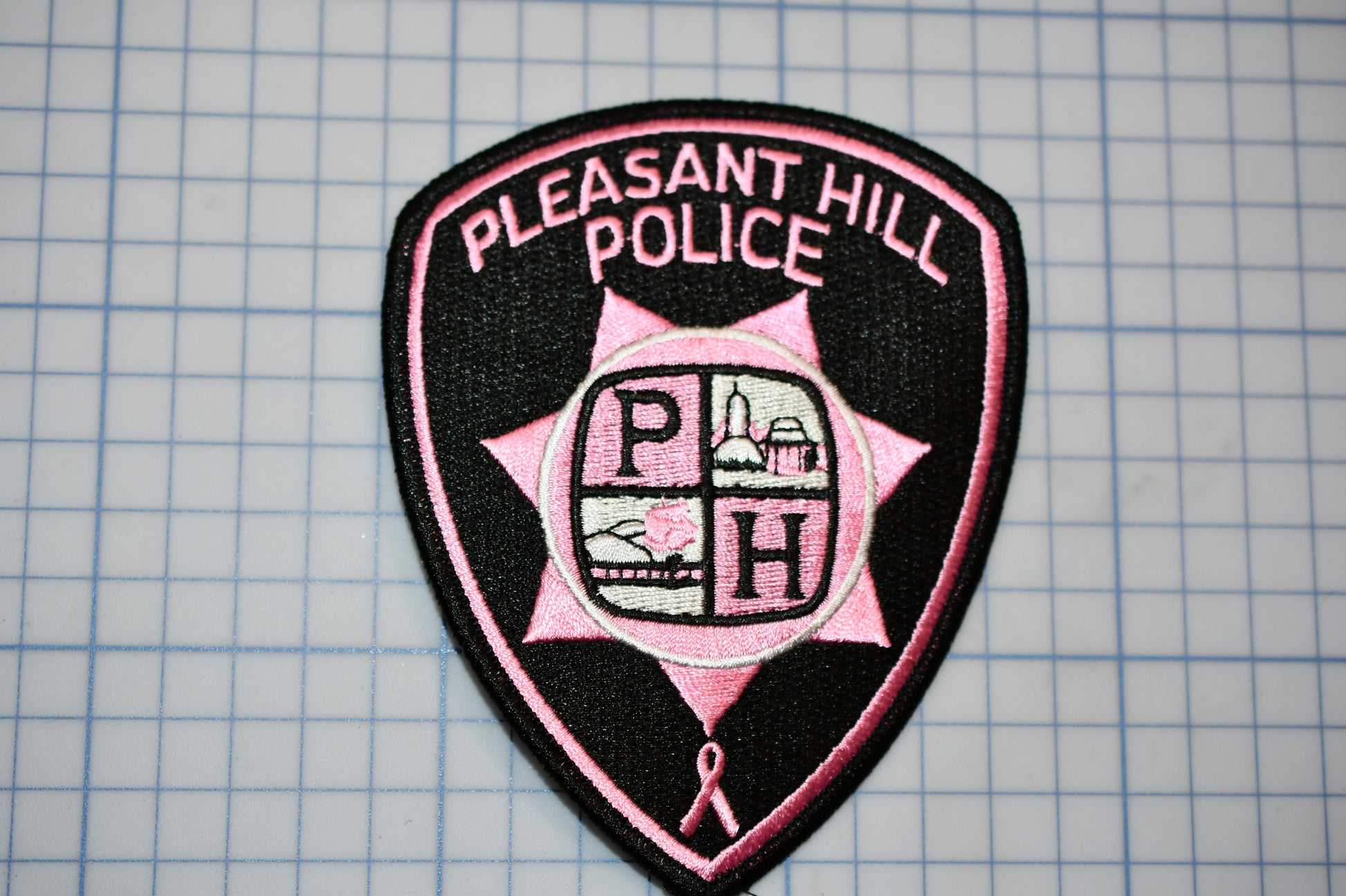 a patch with the words pleasant hill police on it