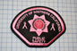 a pink and black patch with the words university of southern california on it