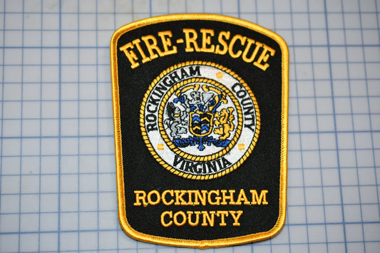 a fire rescue patch sitting on top of a table