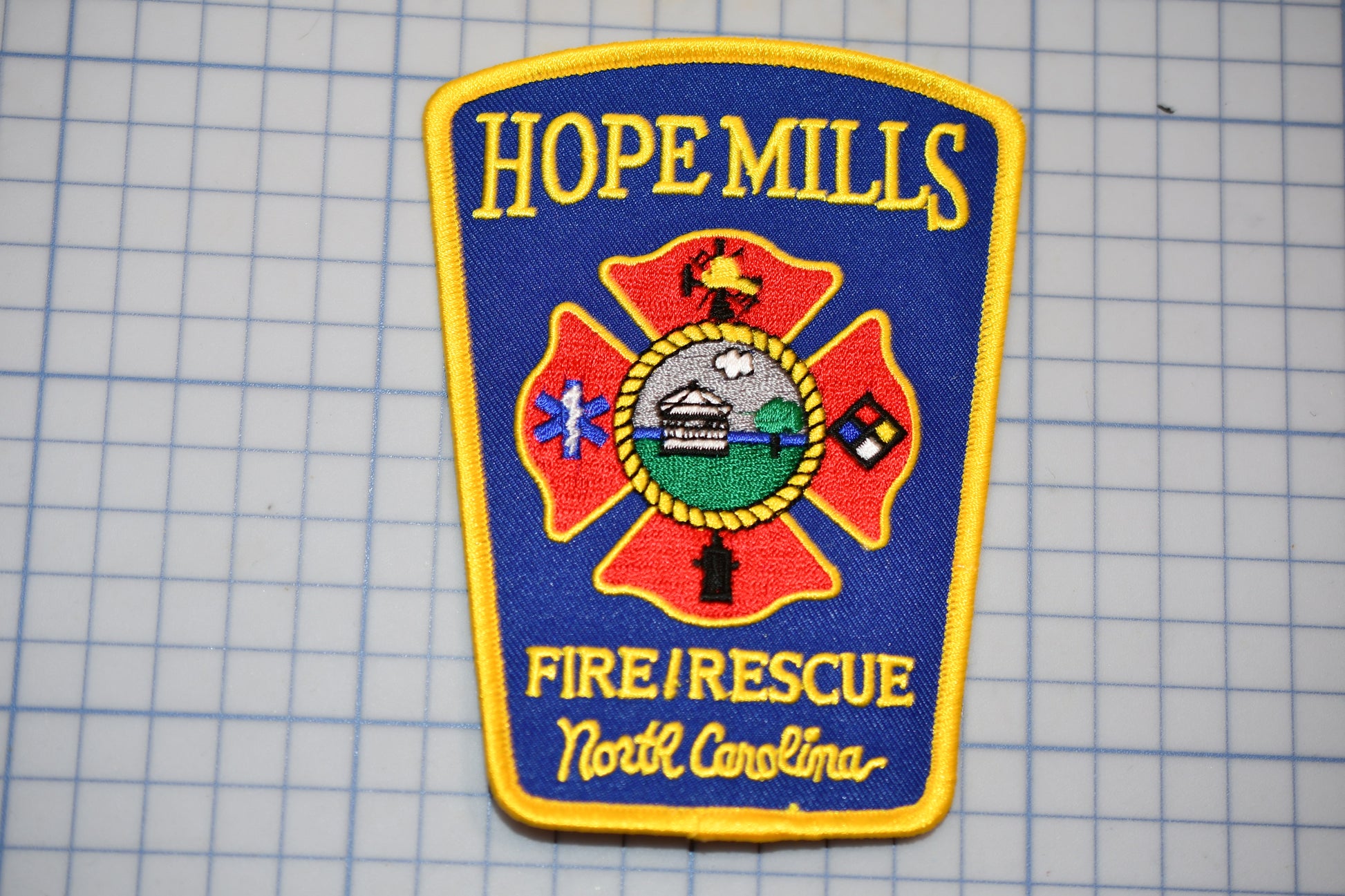 a patch with a fire rescue logo on it